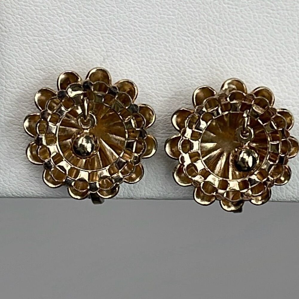 Vintage flower earrings with dangle center & screw back clasp.